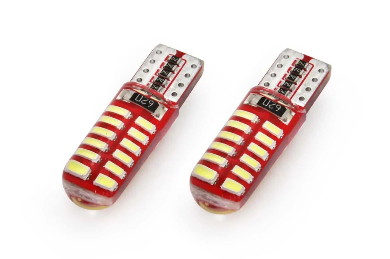 AMIO – Set becuri auto cu LED CANBUS compatibil T10e W5W 24 SMD SILCA Alb 12V, destinat competitiilor auto sau off road