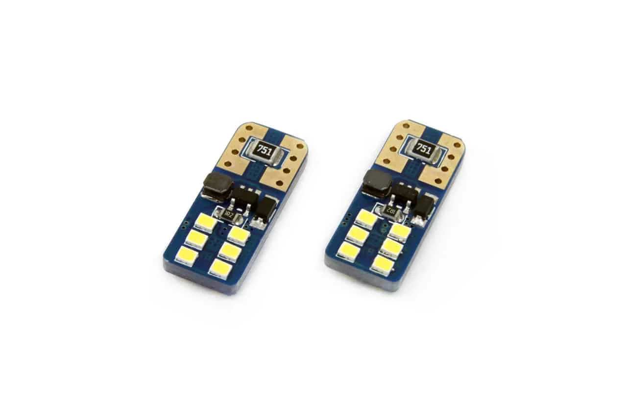 AMIO – Set becuri auto cu LED CANBUS UltraBright compatibil T10e W5W 12 SMD Alb 12/24V, destinat competitiilor auto sau off road