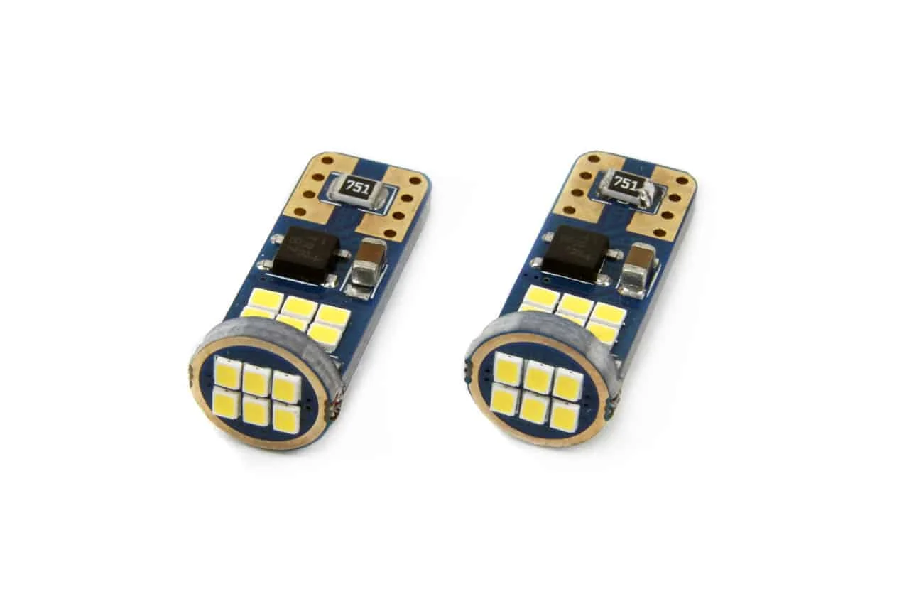 AMIO – Set becuri auto cu LED CANBUS UltraBright compatibil T10e W5W 18 SMD Alb 12V/24V, destinat competitiilor auto sau off road