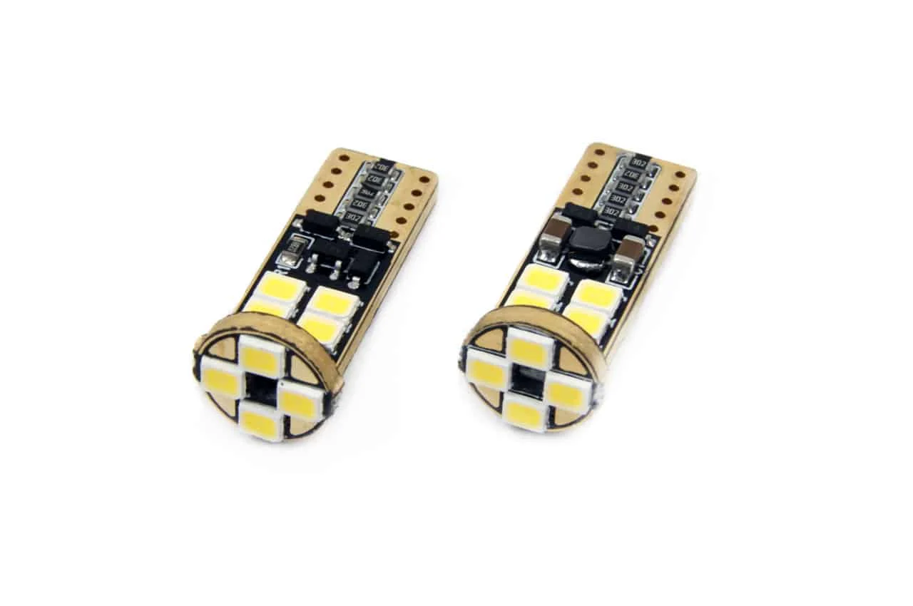 AMIO – Set becuri auto cu LED CANBUS compatibil T10e W5W 12 SMD Alb 12/24V, destinat competitiilor auto sau off road