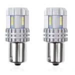 Set becuri auto cu LED CANBUS compatibil P21 R5W/R10W 22 SMD Alb 12V/24V, destinat competitiilor auto sau off-road