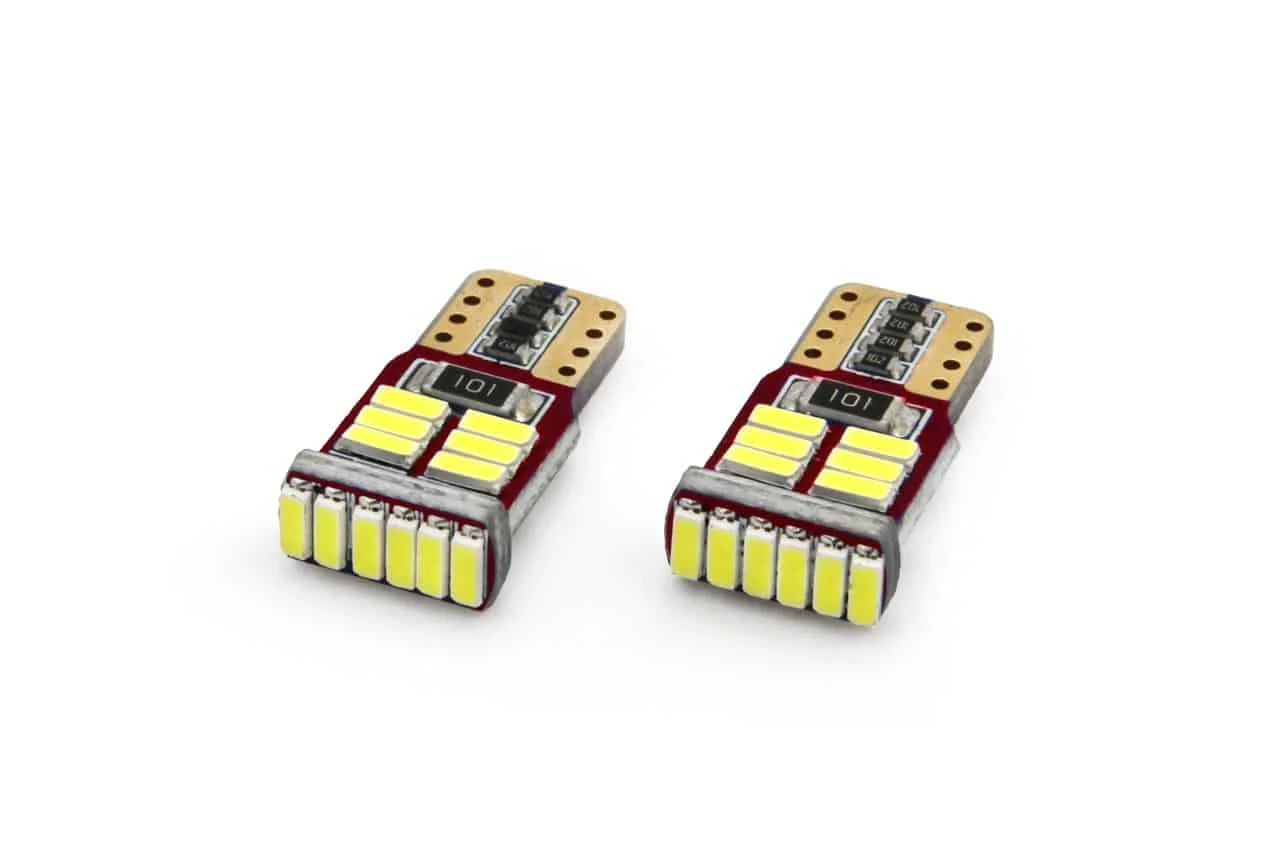 AMIO – Set becuri auto cu LED CANBUS compatibil T10e W5W 18 SMD Alb 12V, destinat competitiilor auto sau off road