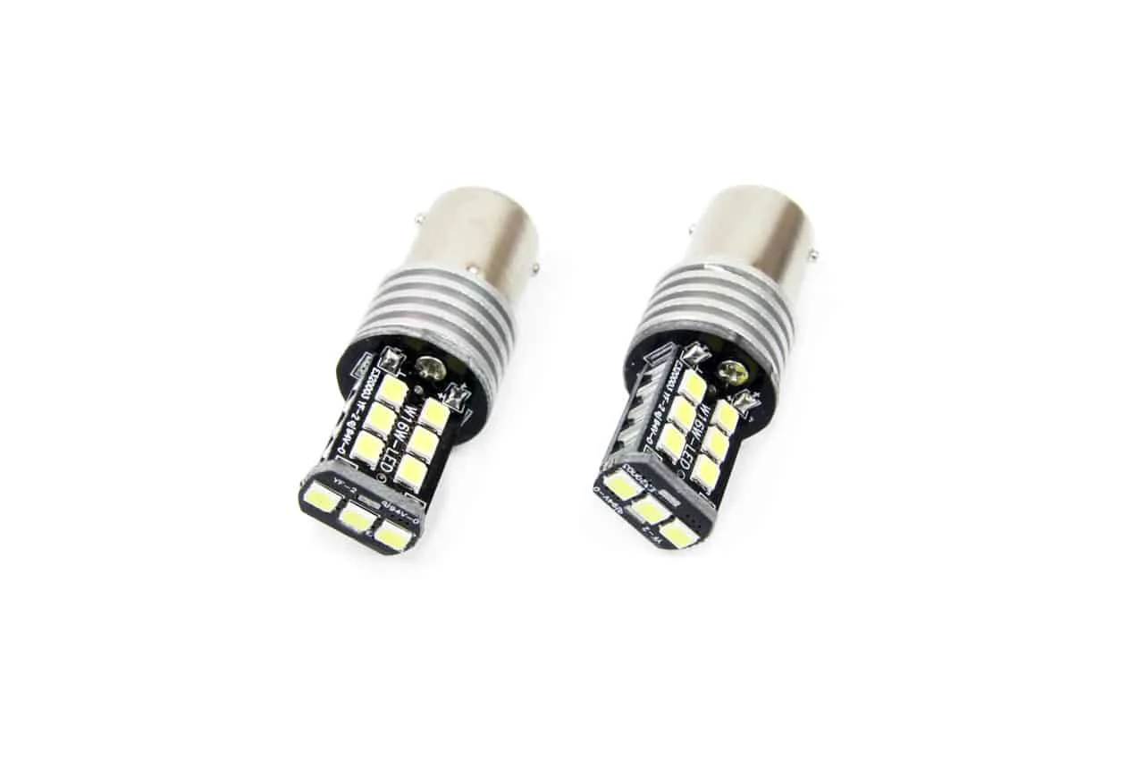 AMIO – Set becuri auto cu LED CANBUS compatibil P21W BA15S 15 SMD 7.5W Alb 12/24V, destinat competitiilor auto sau off road